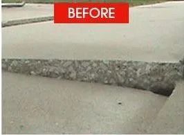 Damaged concrete curb labeled 