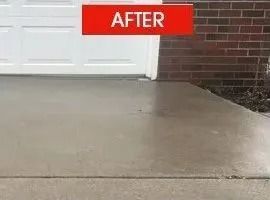 Concrete driveway after repair, with red 