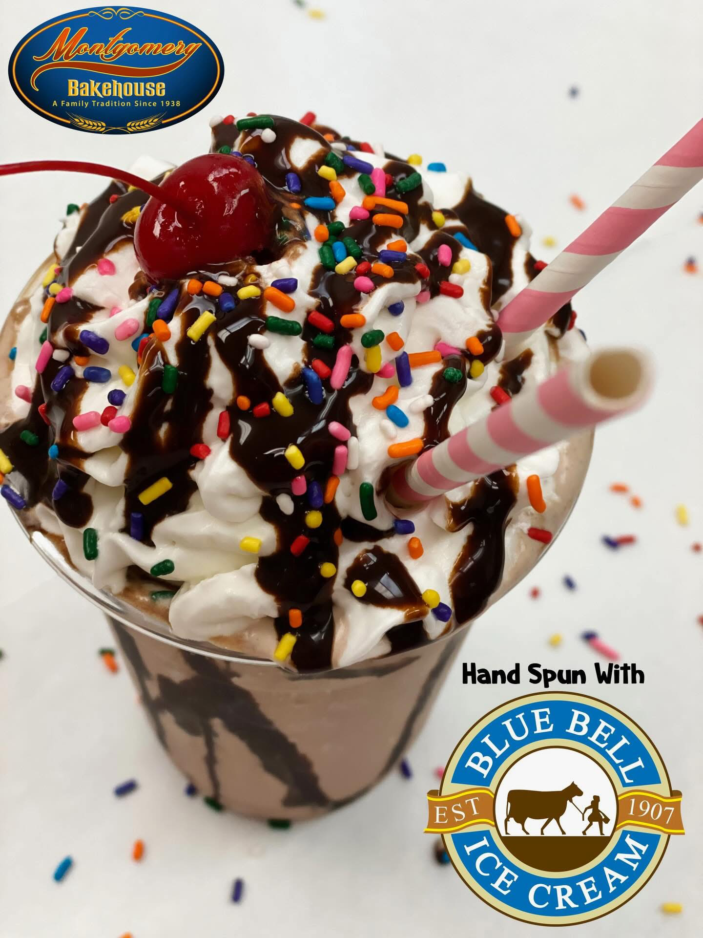 Blue Bell ice cream sundae with whipped cream, chocolate syrup, sprinkles, cherry, and striped straws