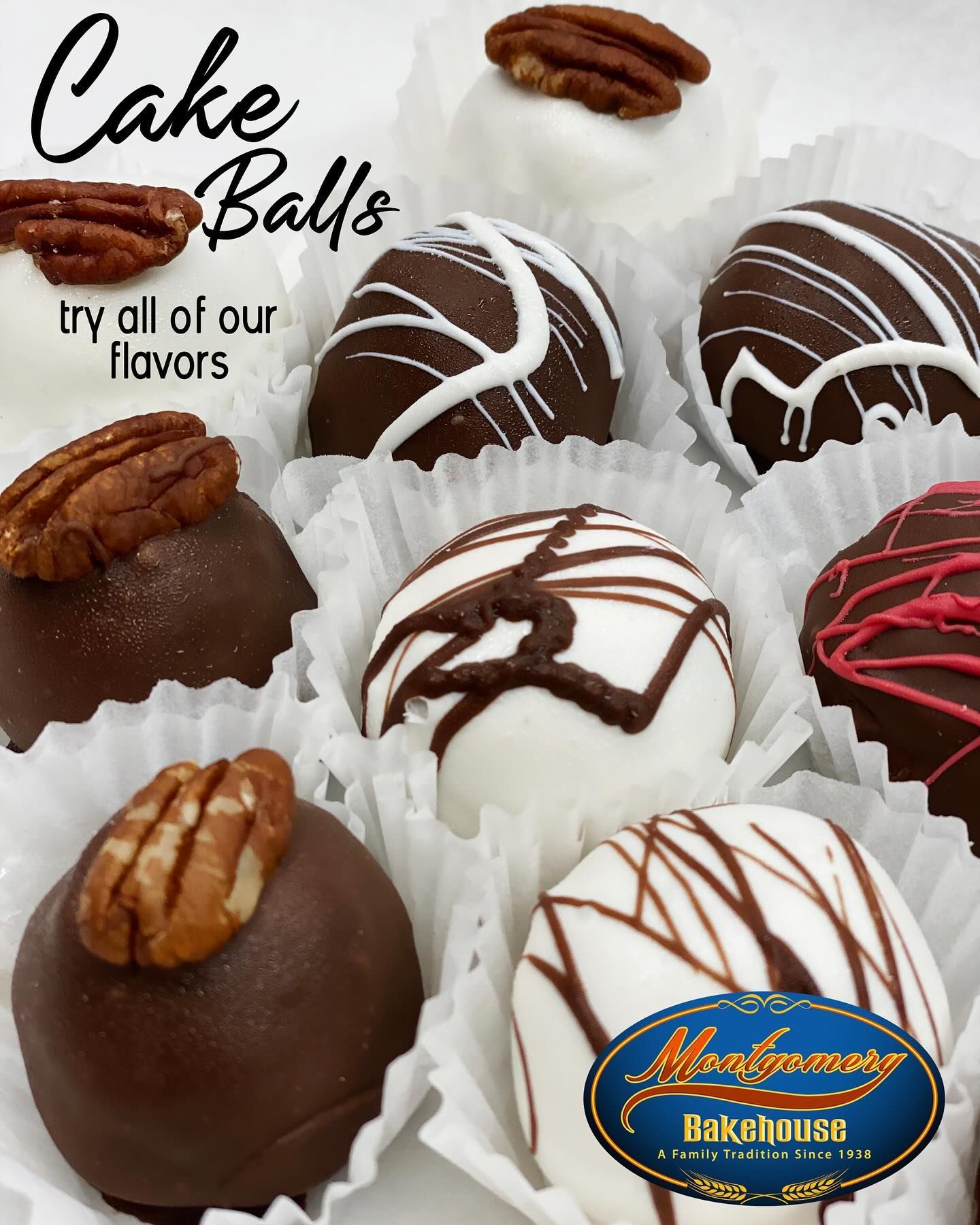 Close-up of cake balls in paper cups, decorated with white and brown icing and pecans.