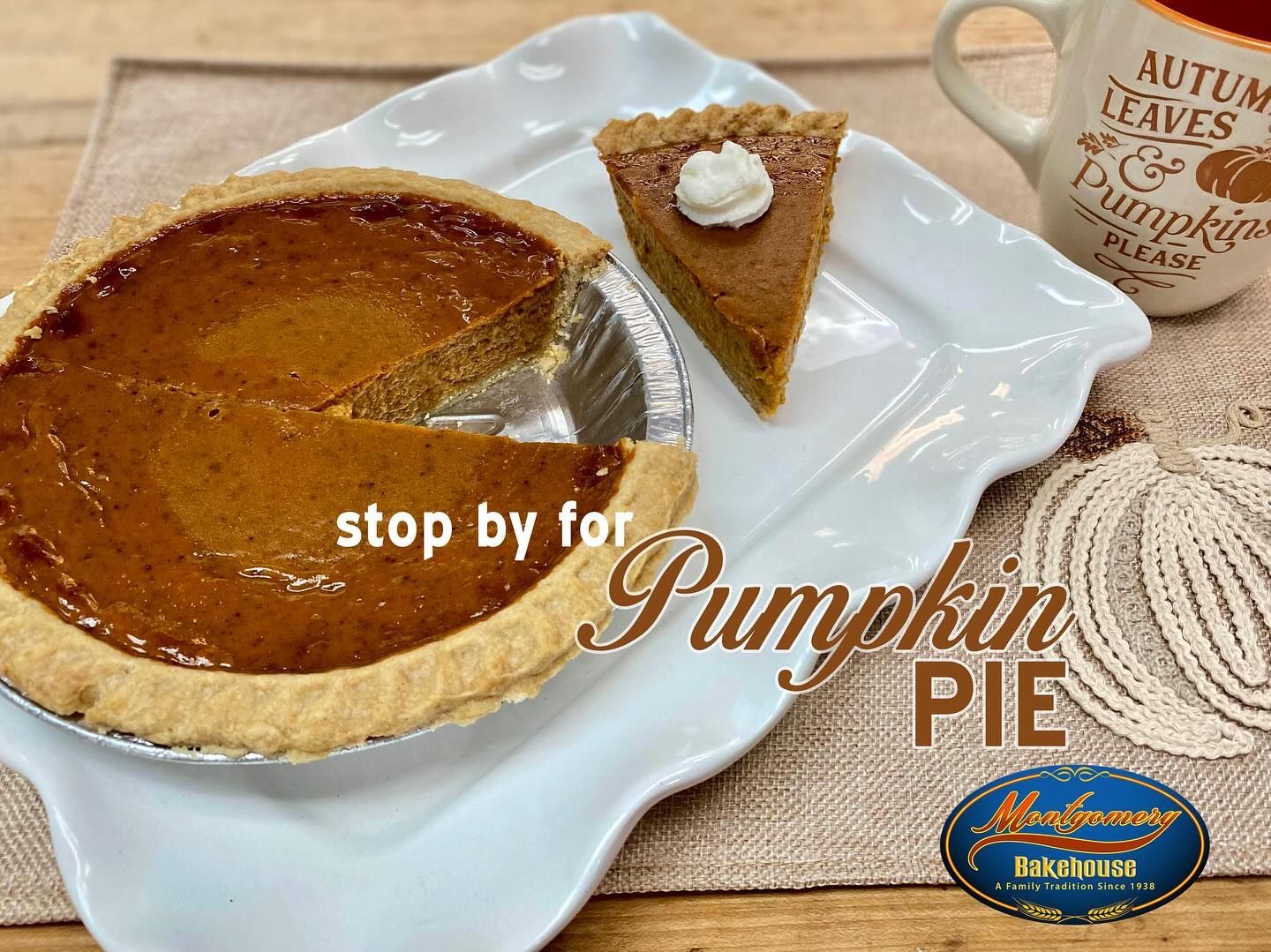 Pumpkin pie on a white plate with a mug that says Autumn Leaves & Pumpkins.