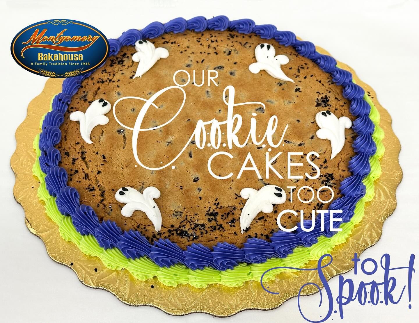 Giant Halloween cookie cake with blue, green, and gold frosting, decorated with ghosts.