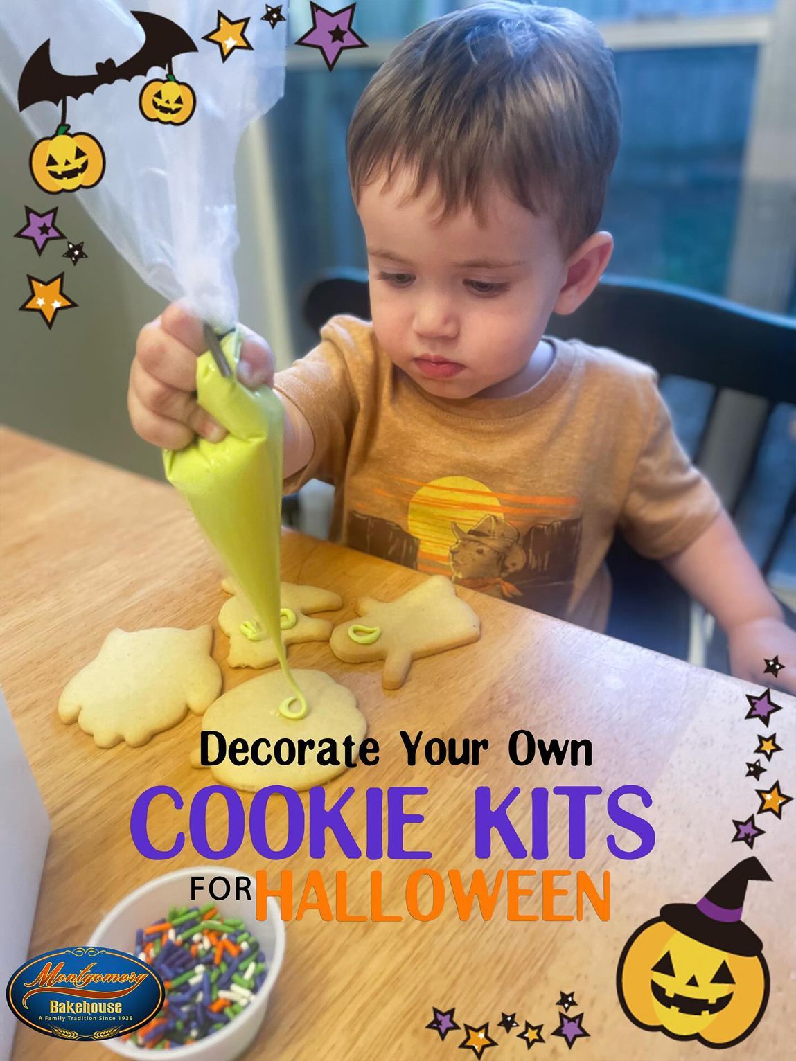 Child decorates Halloween cookies with green icing.