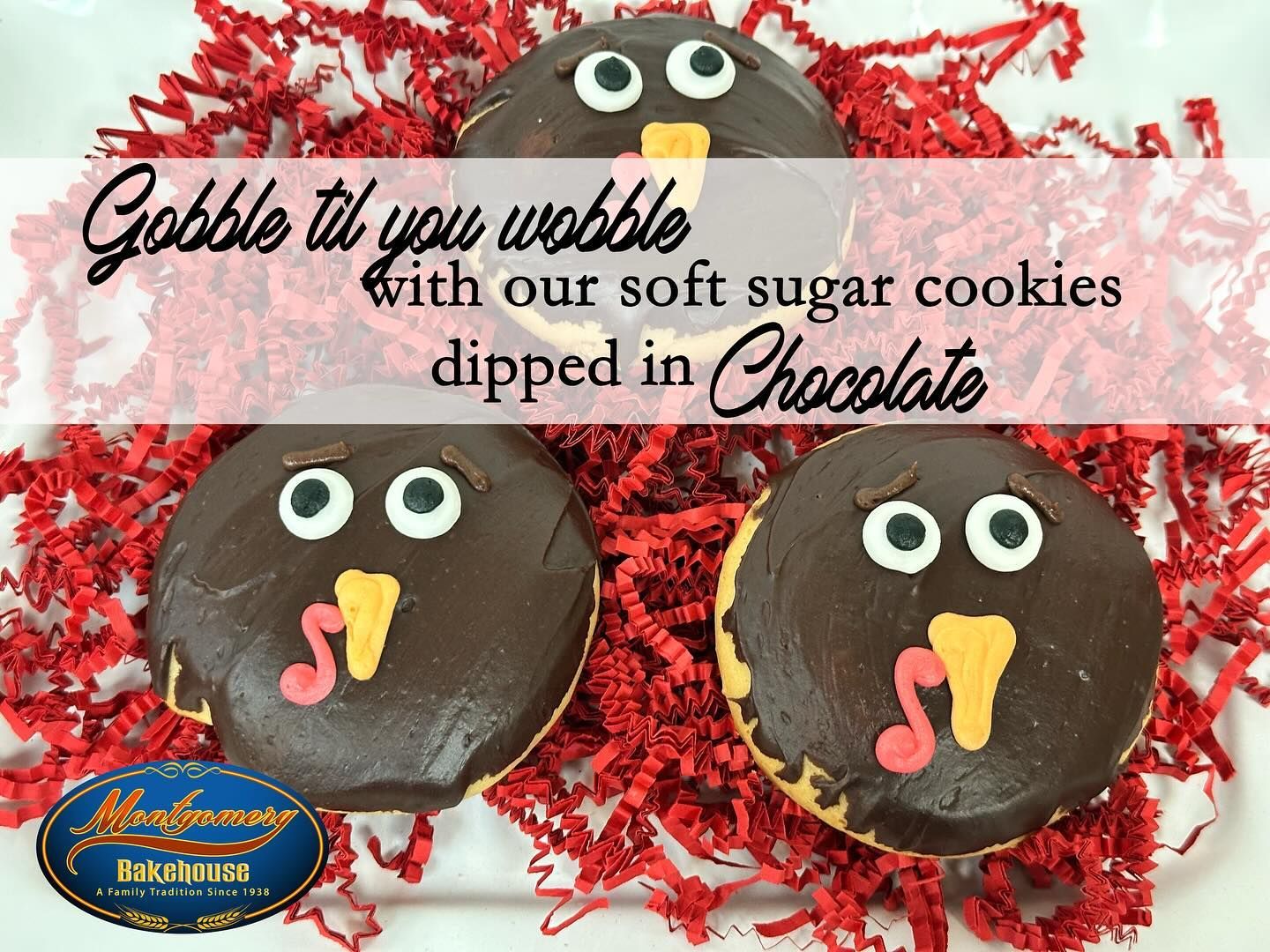 Chocolate-covered turkey cookies with googly eyes, on red paper.