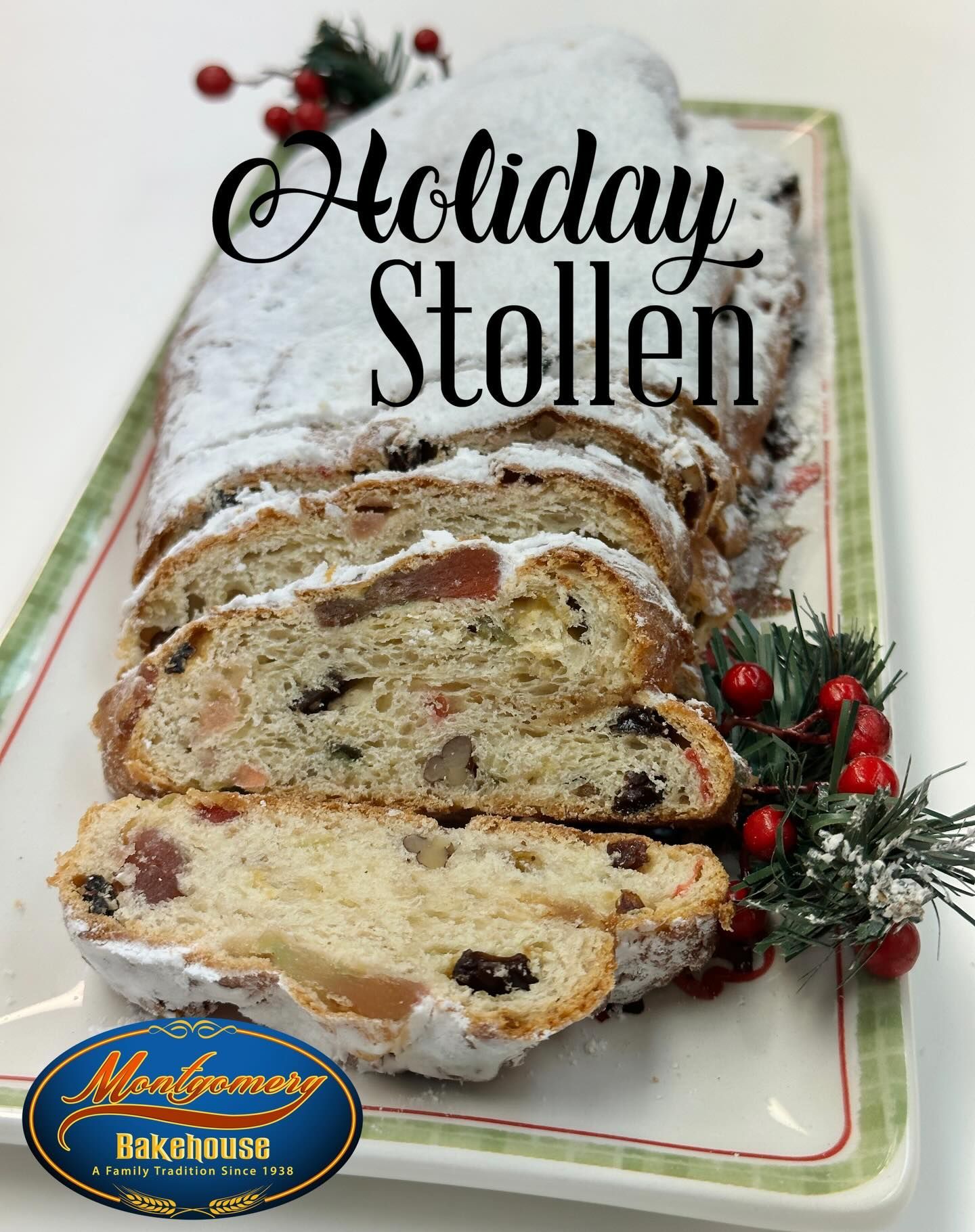 Holiday Stollen, sliced, dusted with powdered sugar, on a rectangular plate with a green and red border.