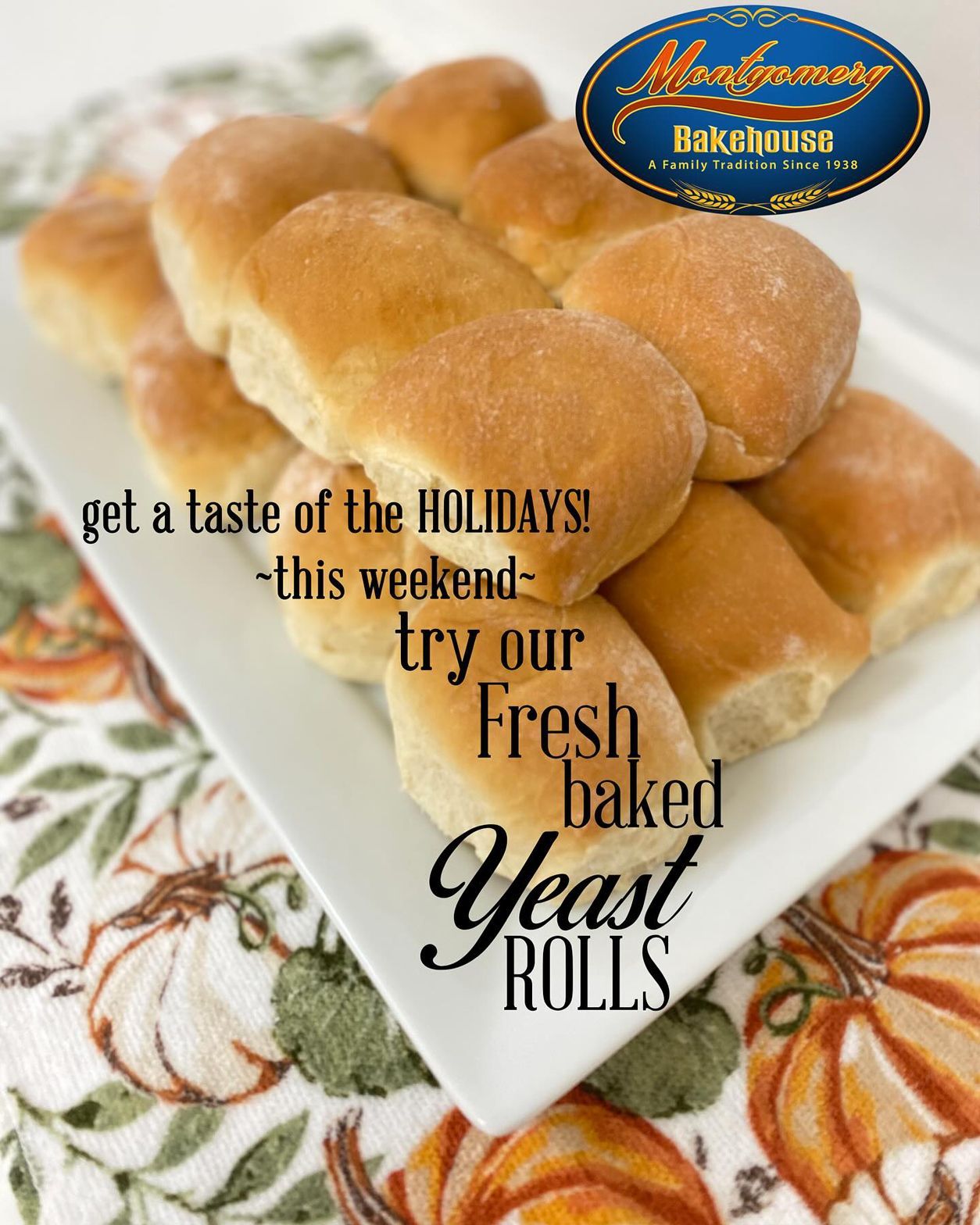 Freshly baked yeast rolls on a white plate, with text promoting a holiday treat from a bakery.