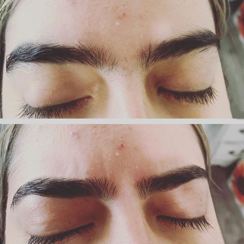 A close up of a woman 's face with her eyes closed.