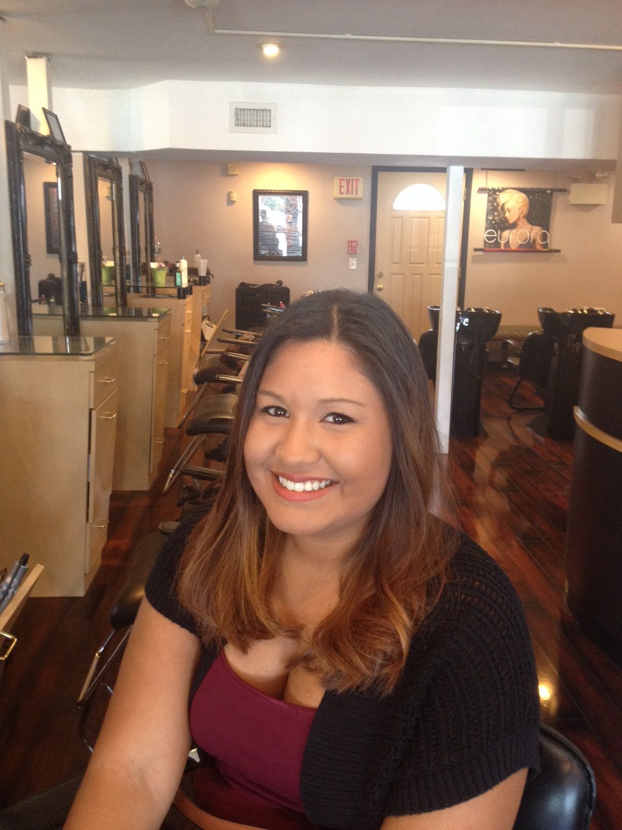 happy salon customer with new hair color