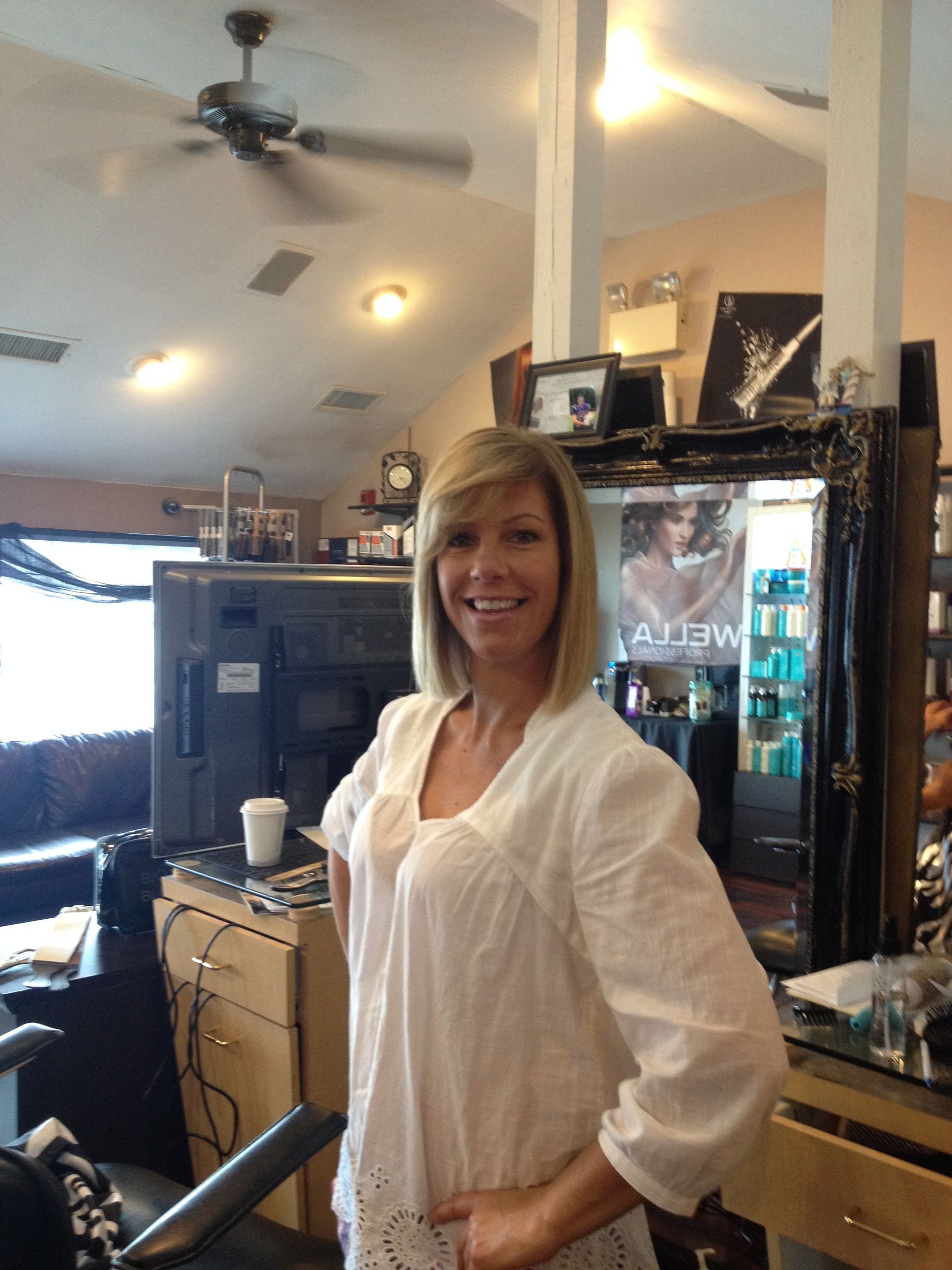 happy salon customer with new hair style