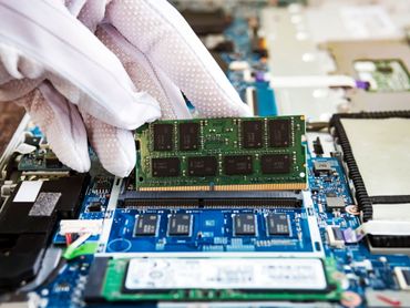 Technician repairing a computer