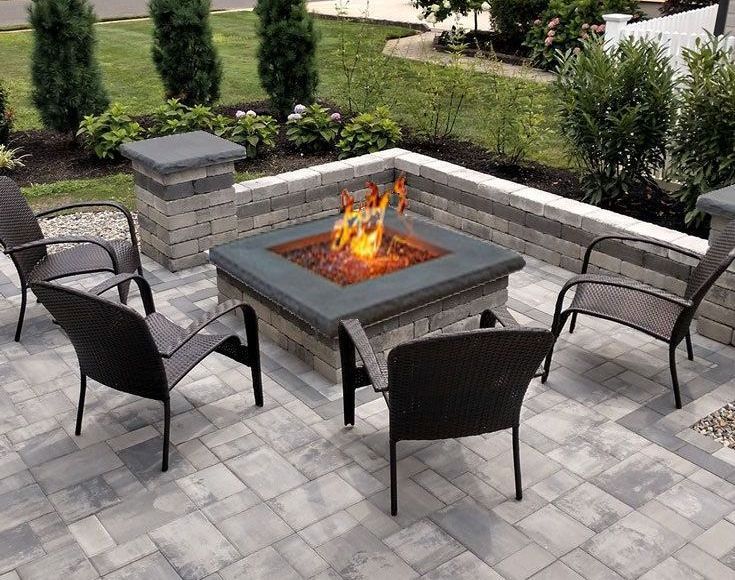 Burning square firepit on patio. Nicolock Verona firepit kit for sale in Lebanon PA.