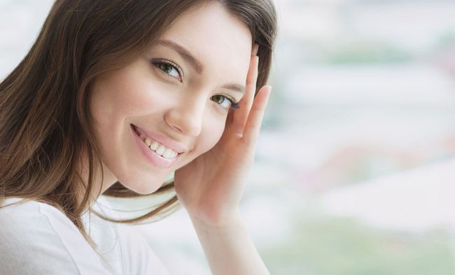 A happy woman after her TempSure Envi treatment