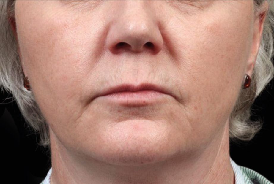 a close up of a women's face
