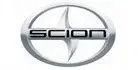 Scion logo: a silver, circular emblem with a stylized cross and the word