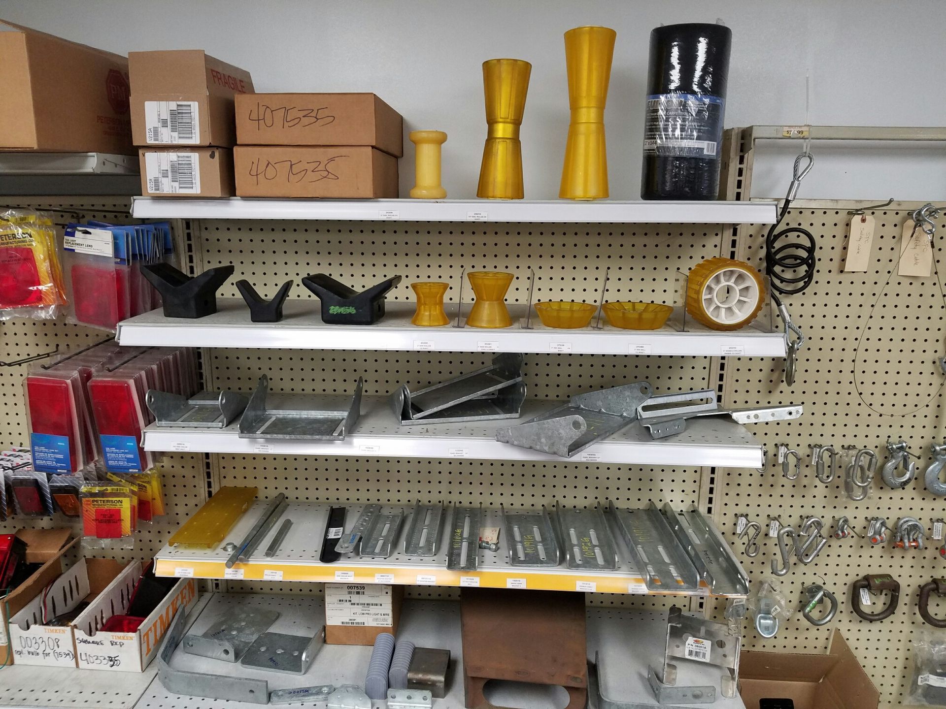 Shelves in a store filled with various items including tape