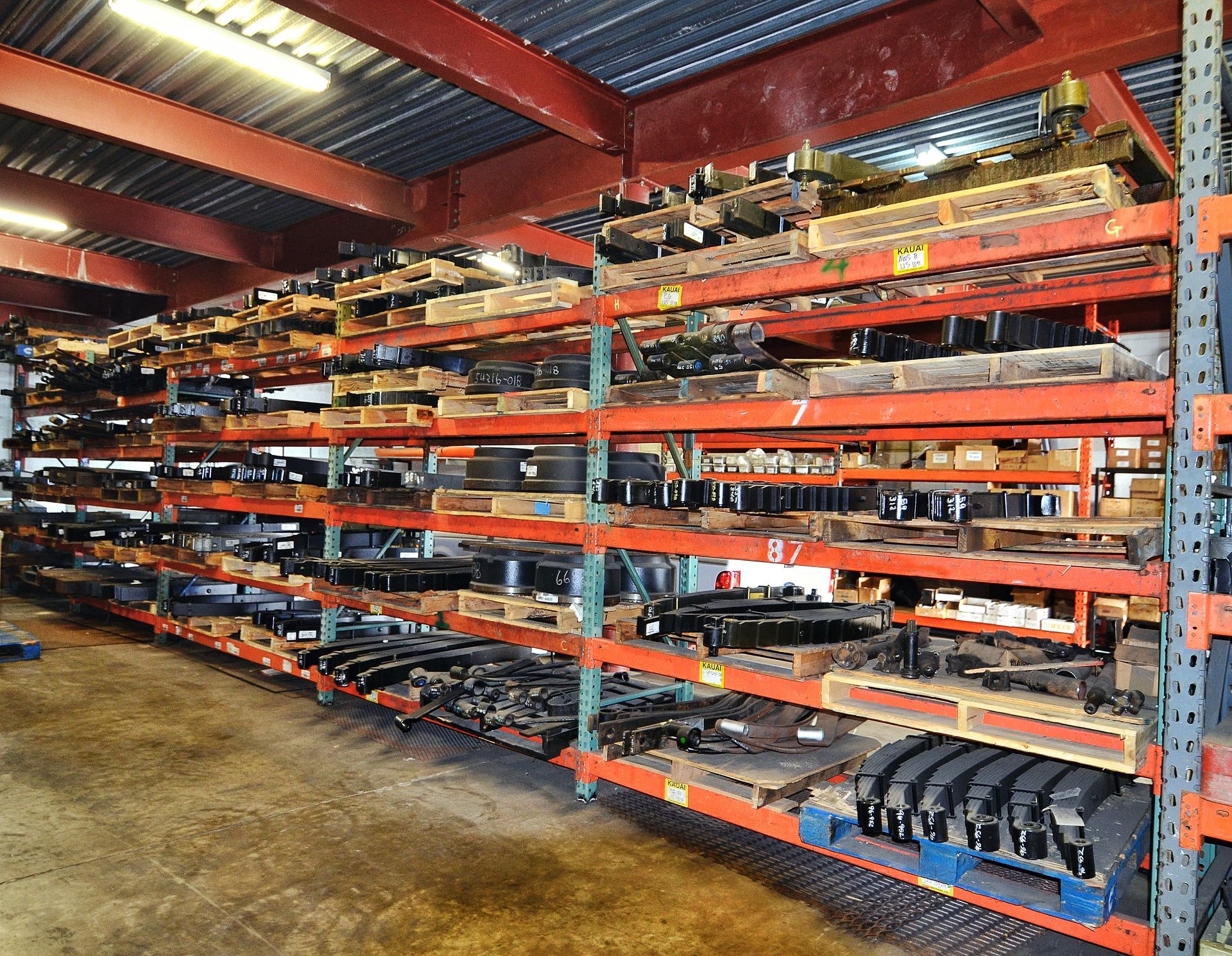 A warehouse filled with lots of pallets and shelves
