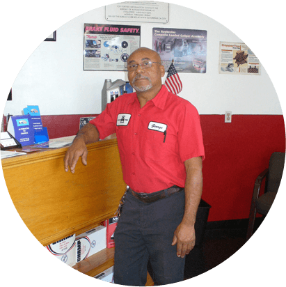 A man standing in an office/shop