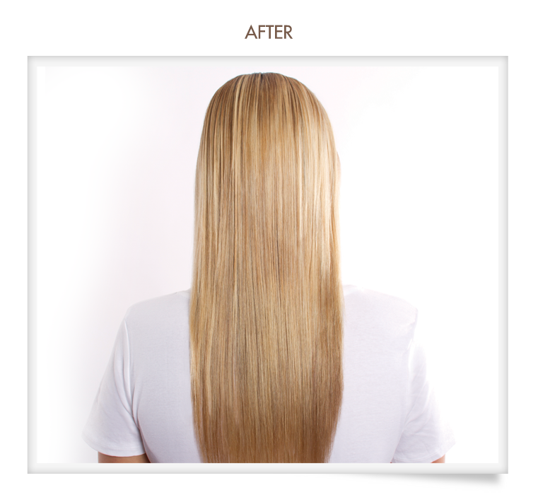 A woman with long blonde hair is wearing a white shirt.