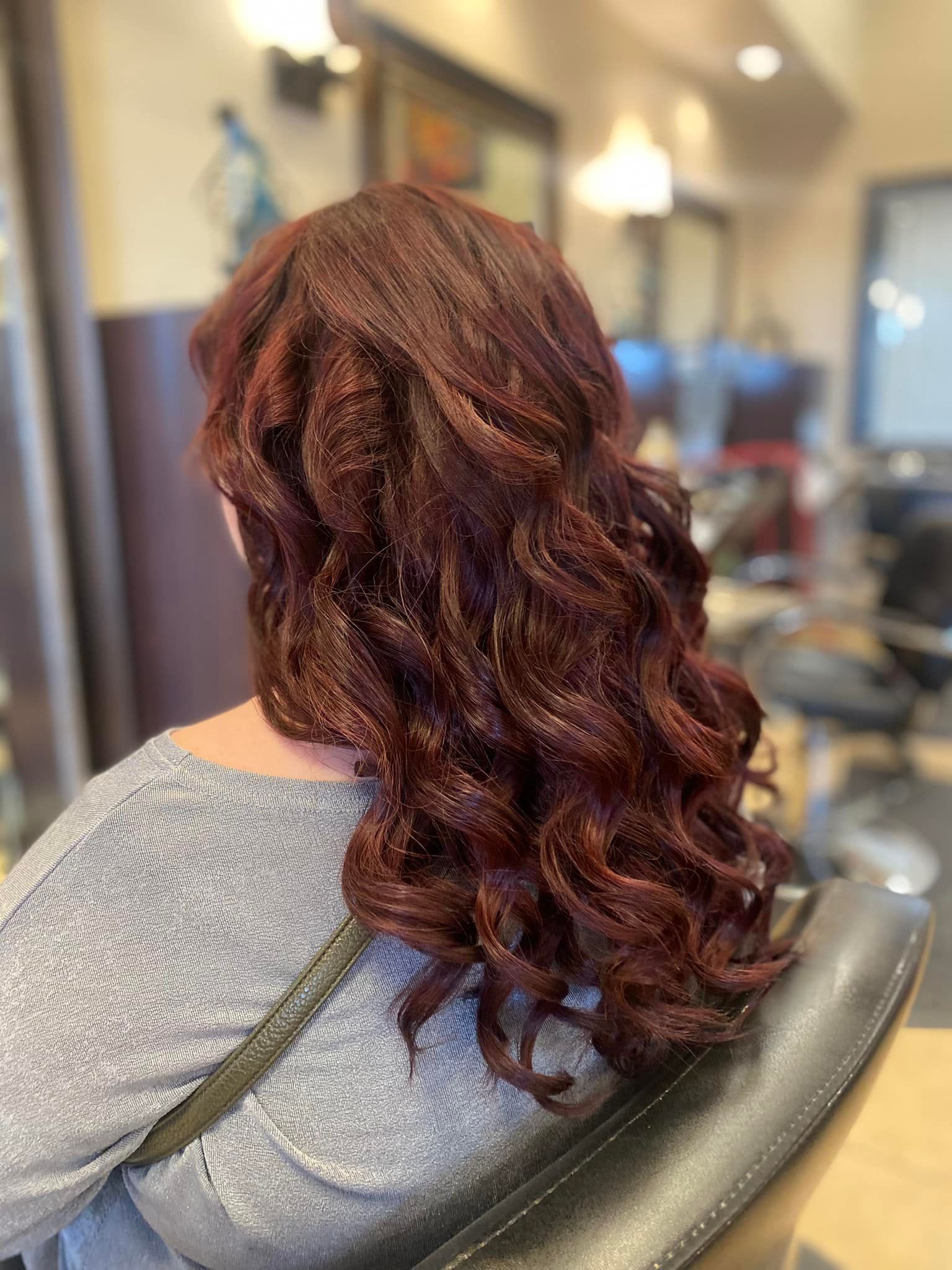 curly auburn hairstyle