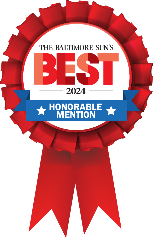 A red ribbon with the words The Baltimore Sun's Best Honorable mention on it.