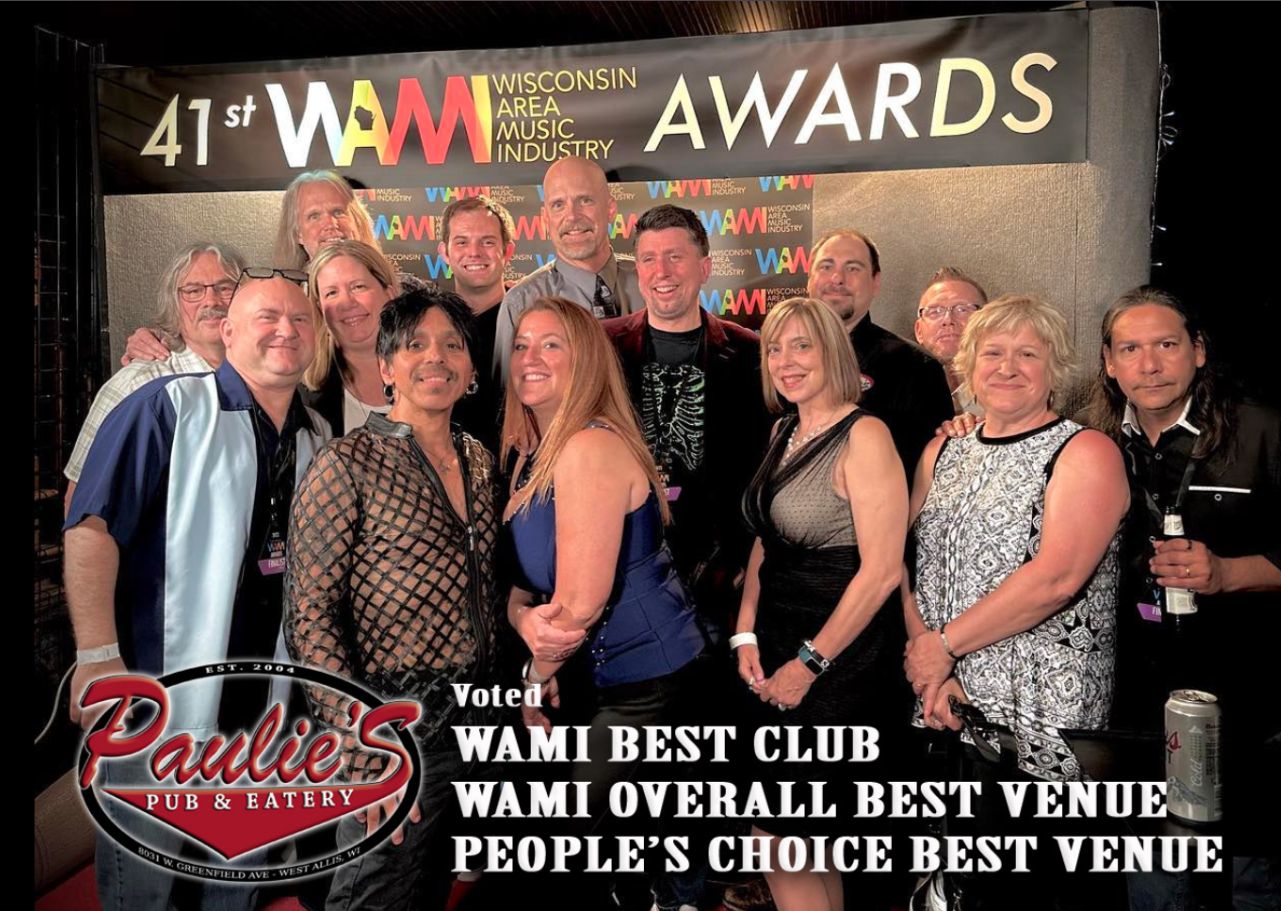 Group posing at the 41st VAM awards with “Best Club” and “People’s Choice Best Venue” signage