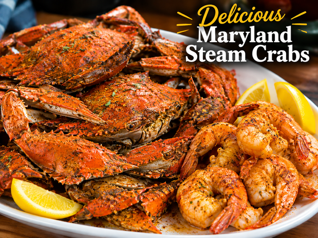 Maryland steamed crabs and shrimp on a platter with lemon wedges and seasoning