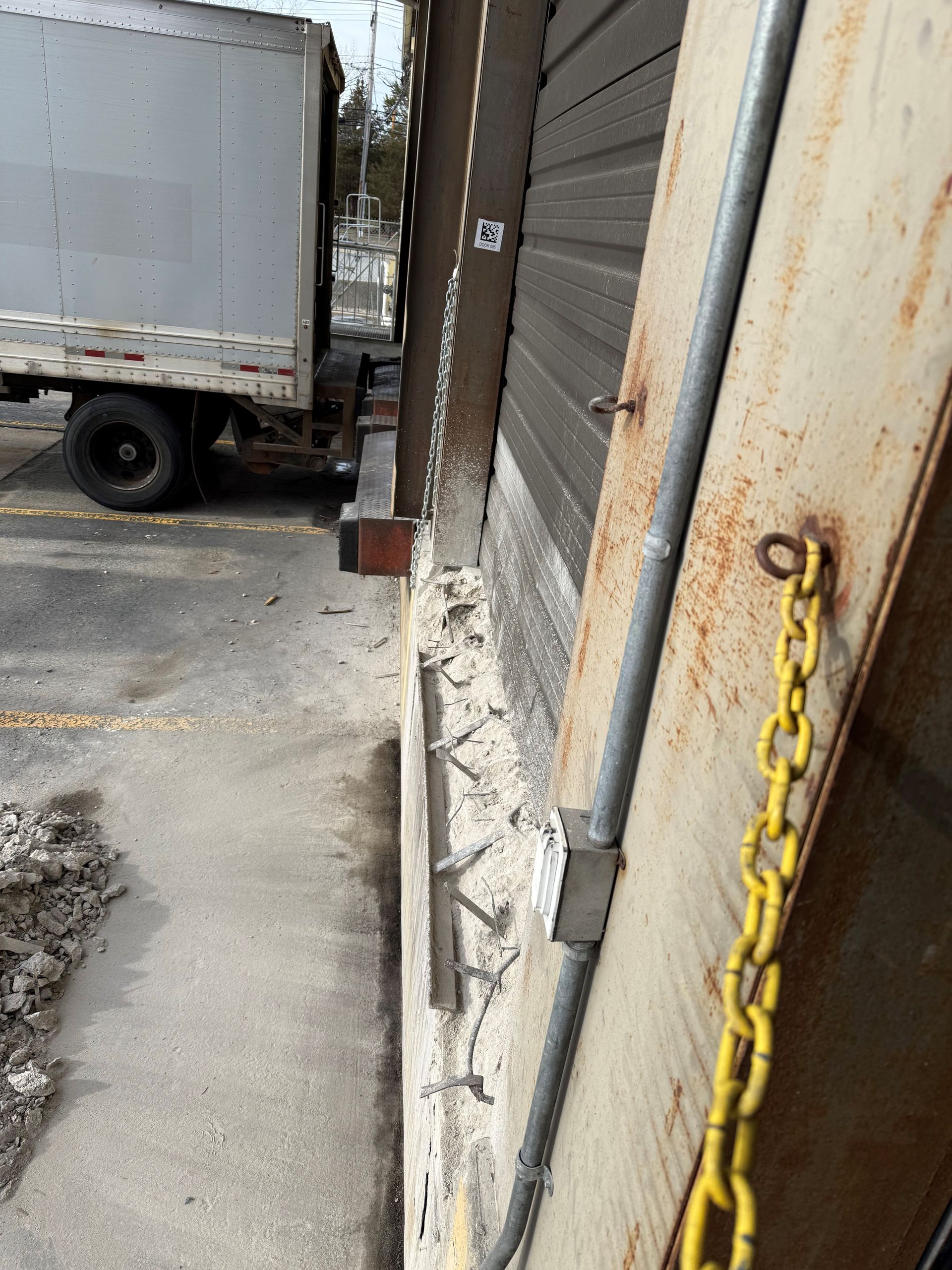 Loading dock with a truck parked in front of it