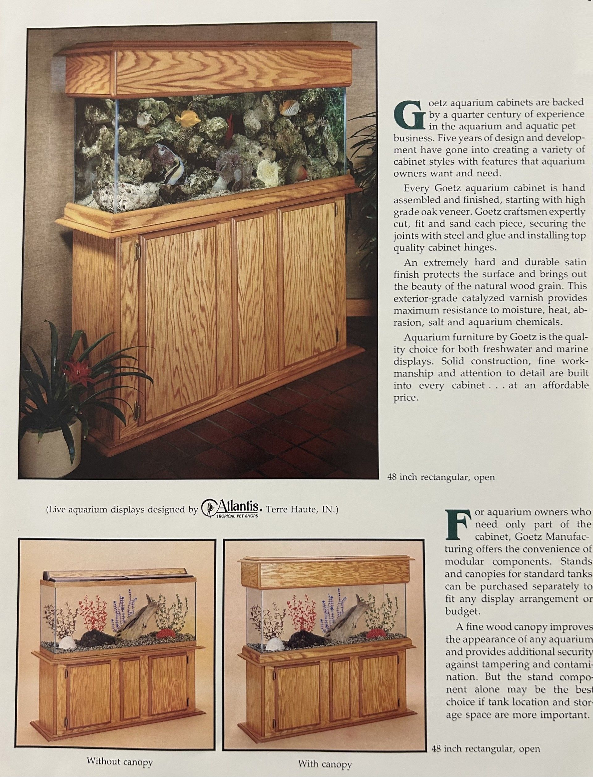Aquarium displays; tall wooden cabinet with glass tank; featuring rocks and plants; two smaller tank models.