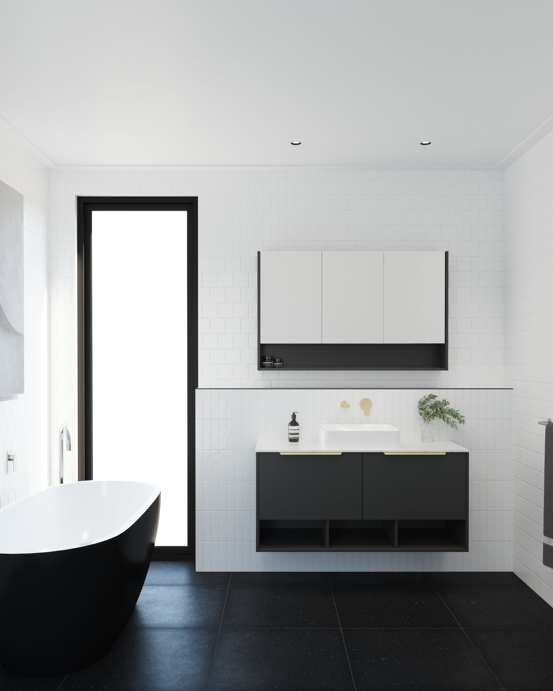 A bathroom with a black tub and a black sink