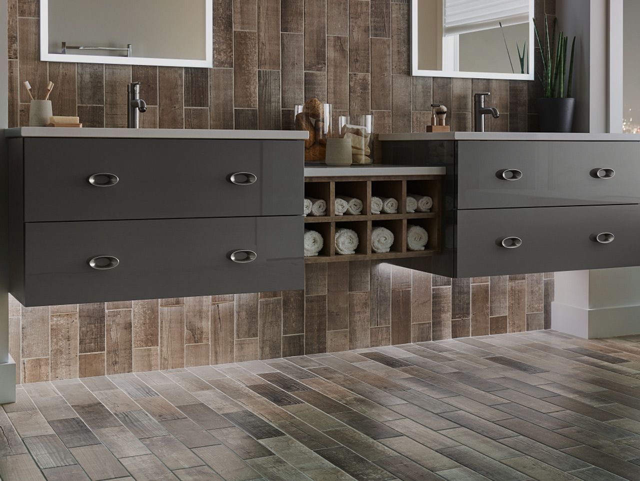 A bathroom with two sinks and two mirrors