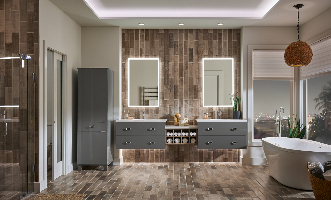 A bathroom with two sinks, two mirrors, a tub and a shower.