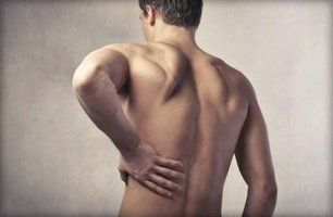 Learn More About Manual Physical Therapy Man with back pain