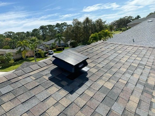 A roof with a chimney on top of it