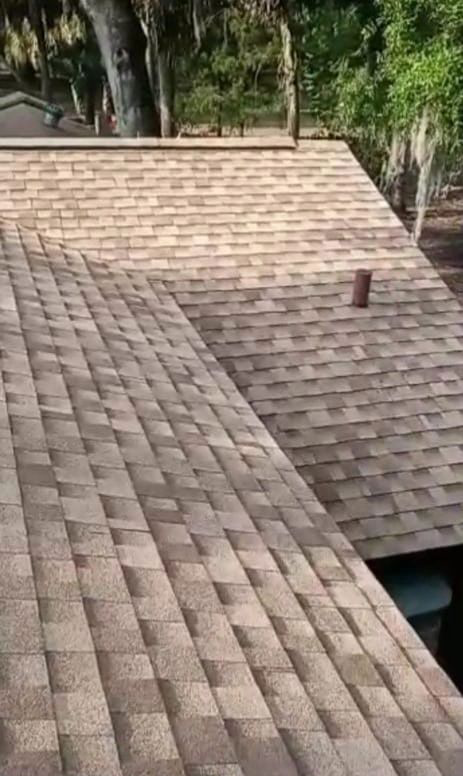 A close up of a roof with shingles on it.