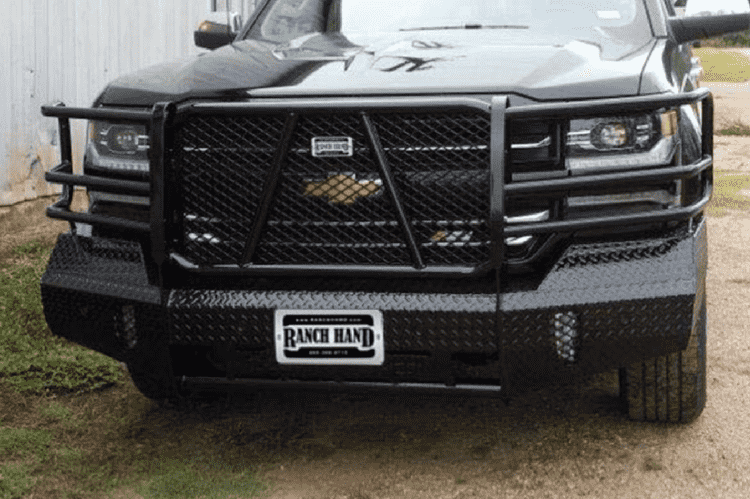 Black Chevy truck with a Ranch Hand bumper guard.