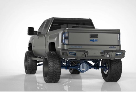 A lifted gray pickup truck with large black tires and a custom rear bumper, shown from the rear.