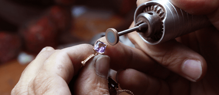 Jewelry ring being repaired.