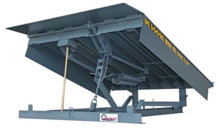 Gray industrial hydraulic scissor lift platform with raised deck and support arms