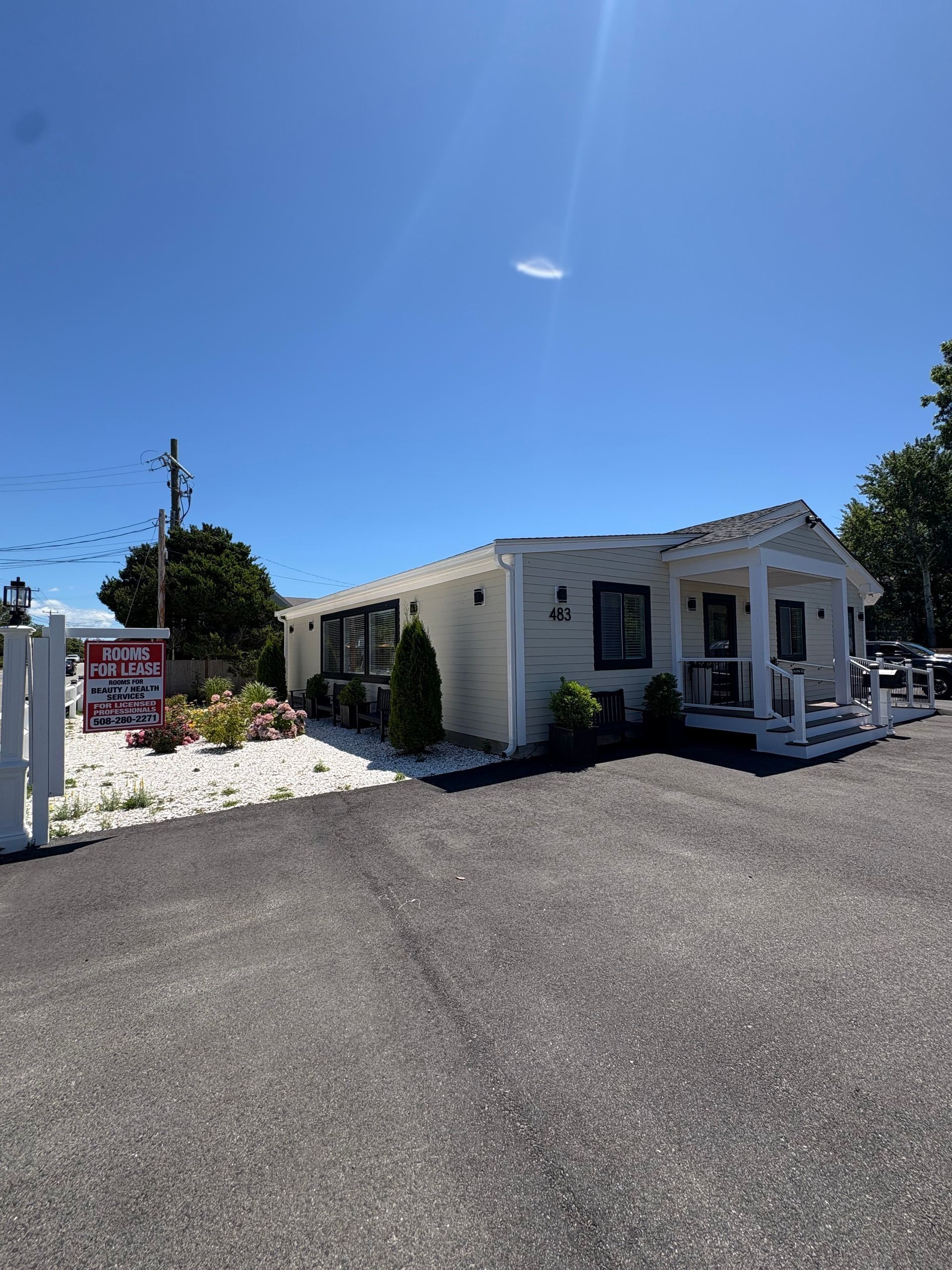 Cream-colored one-story commercial building with a 