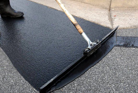 Learn More About Commercial Asphalt Sealcoating Commercial asphalt sealcoating