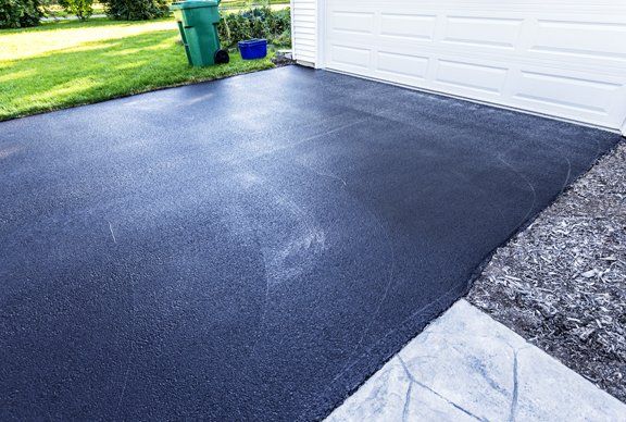 Learn More About Residential Asphalt Sealcoating Residential asphalt sealcoating