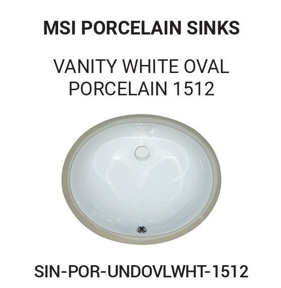White oval porcelain bathroom sink.