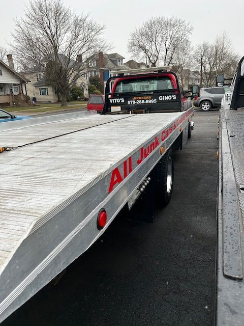 A tow truck with flatbed
