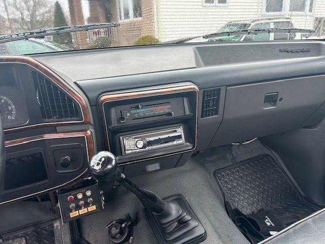 a close-up of the dashboard of a 1989 Ford F-450