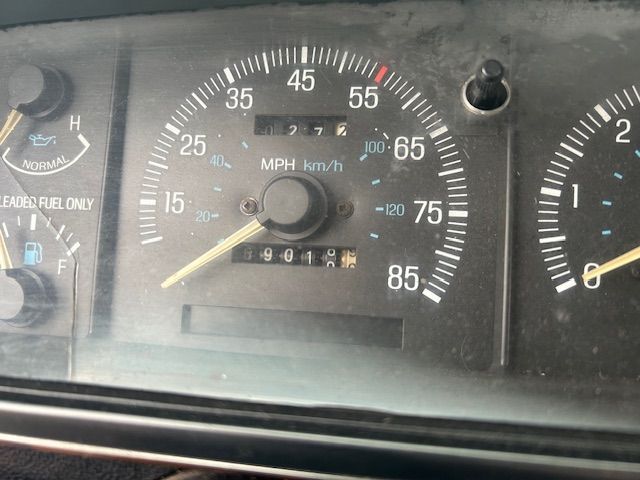 a close-up of a 1989 Ford F-450  speedometer