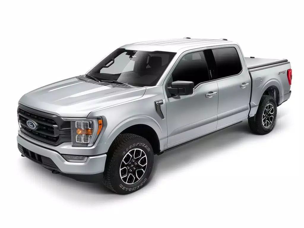 Silver Ford F-150 truck, black accents, black wheels, and a tonneau cover