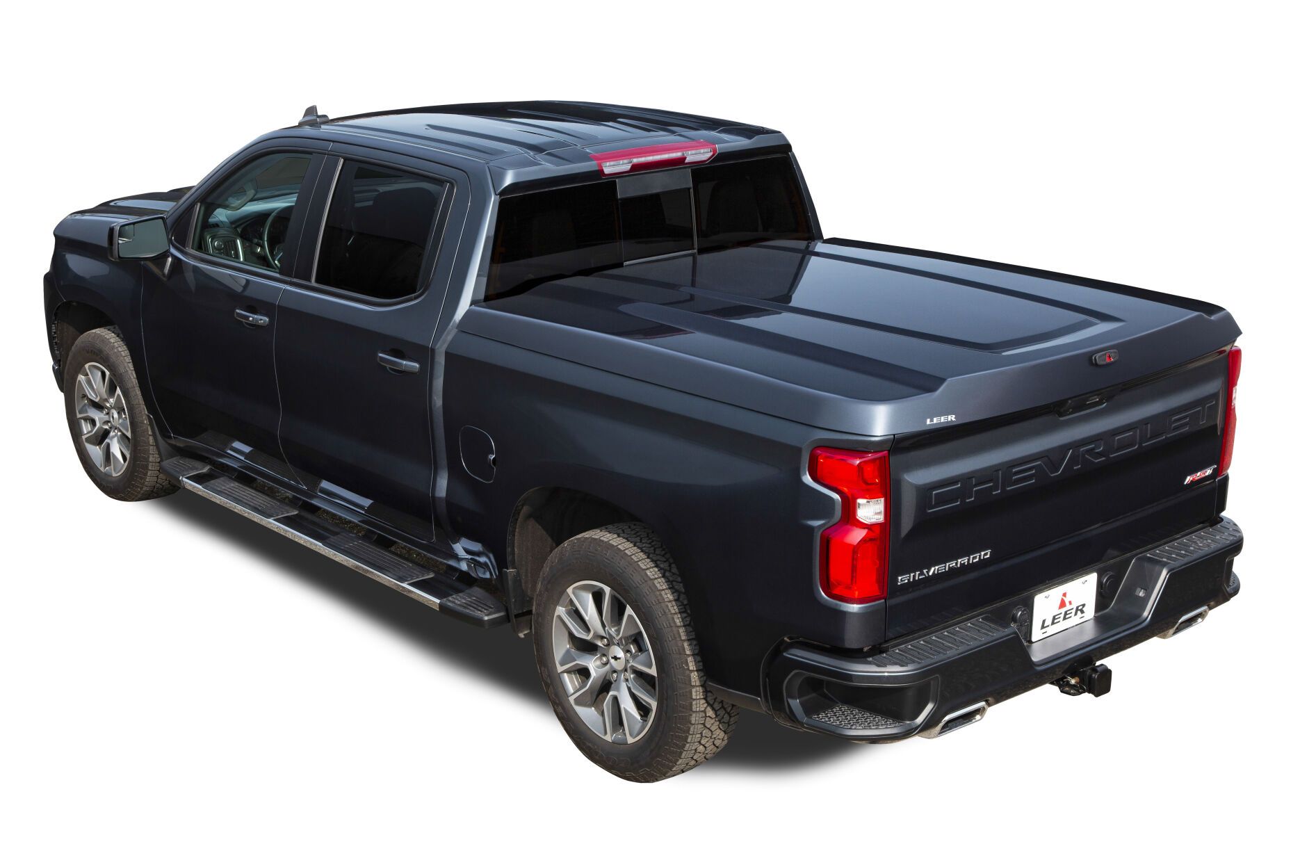 Dark gray Chevy Silverado truck with a closed bed cover.