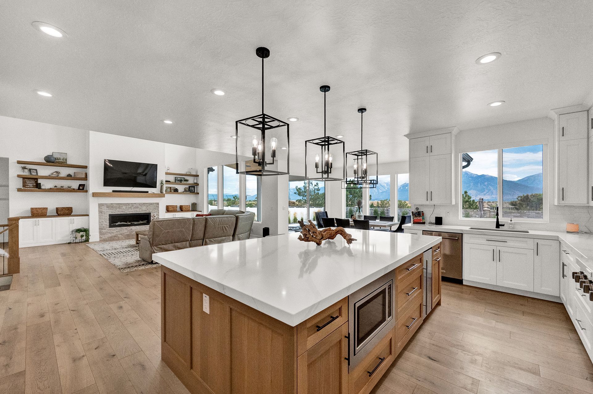 There is a large island in the middle of the kitchen.