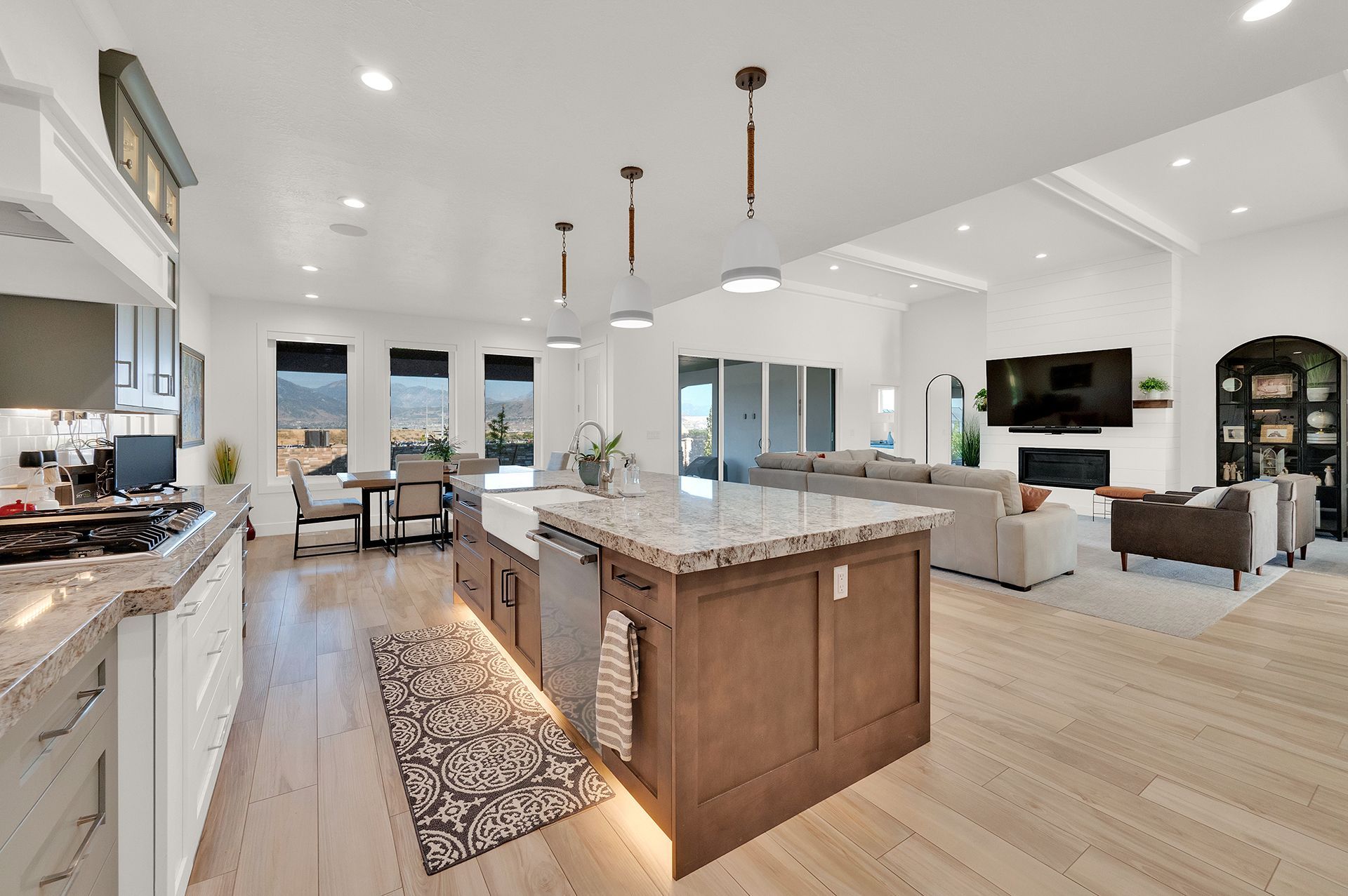 There is a large island in the middle of the kitchen.