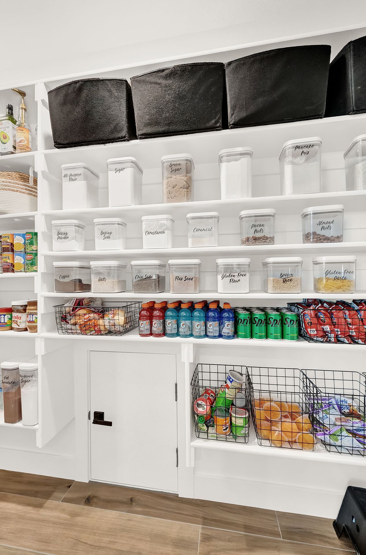 A pantry filled with lots of food and drinks.